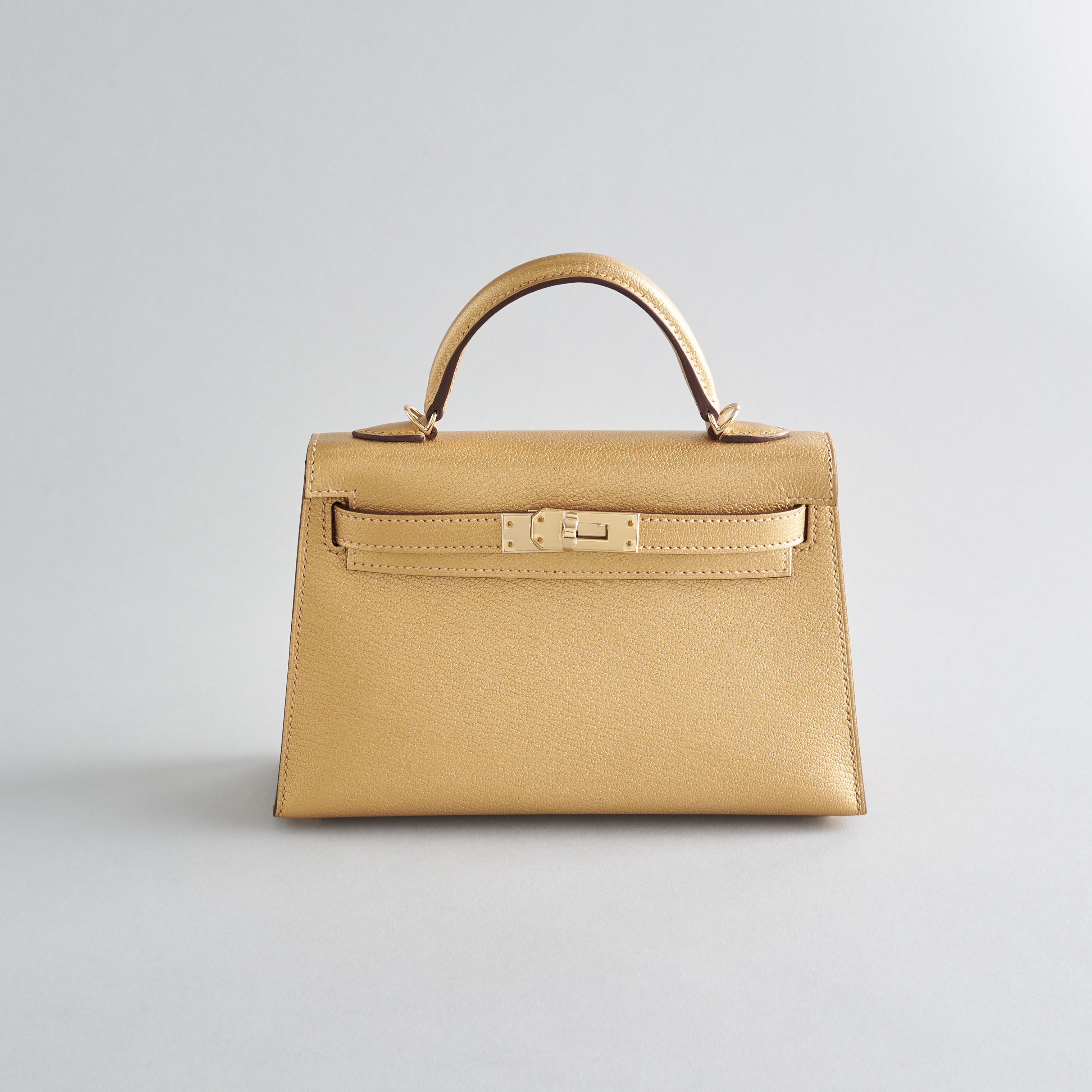 Hermes Kelly Mini Chamkilight Chevre Dore Permabrass