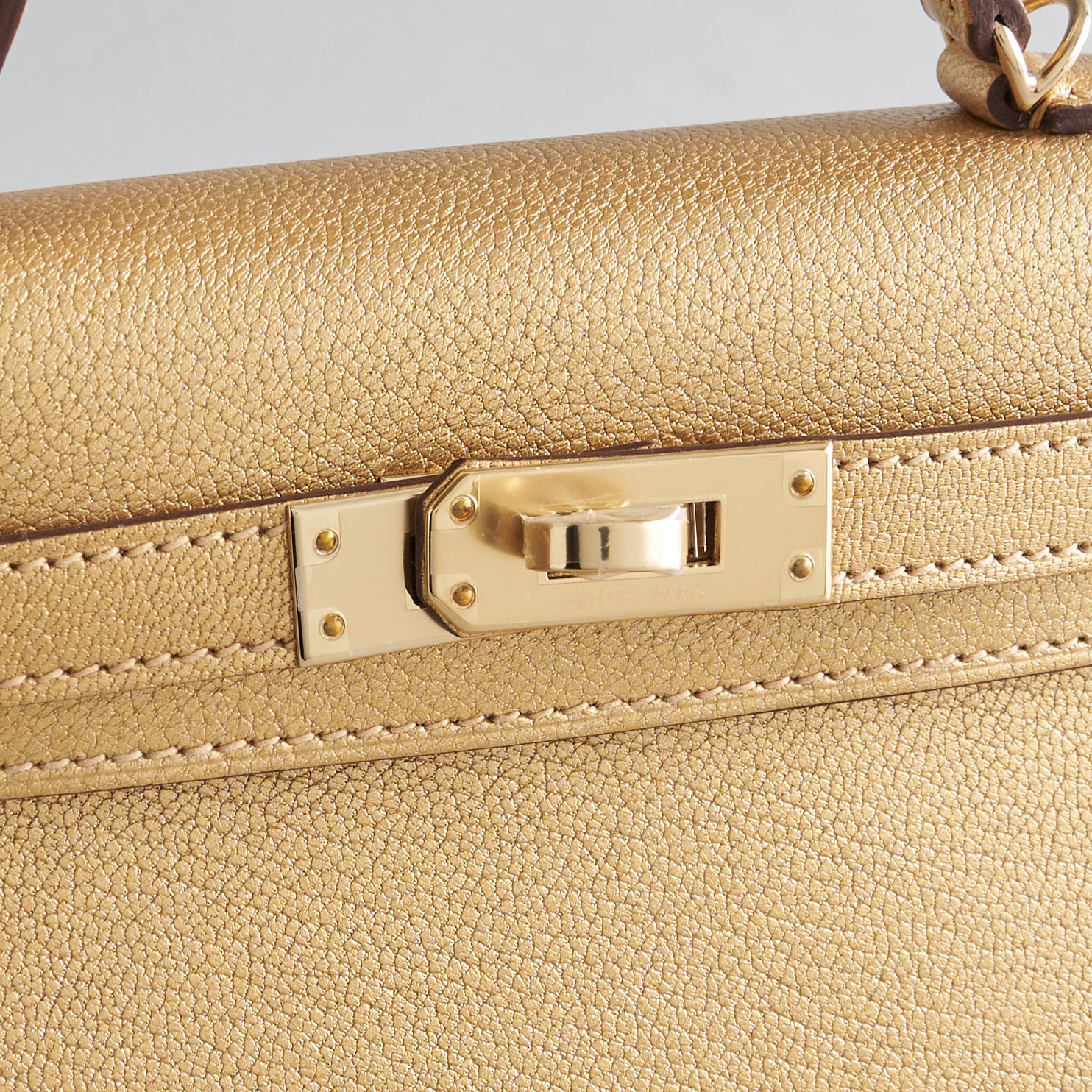 Hermes Kelly Mini Chamkilight Chevre Dore Permabrass