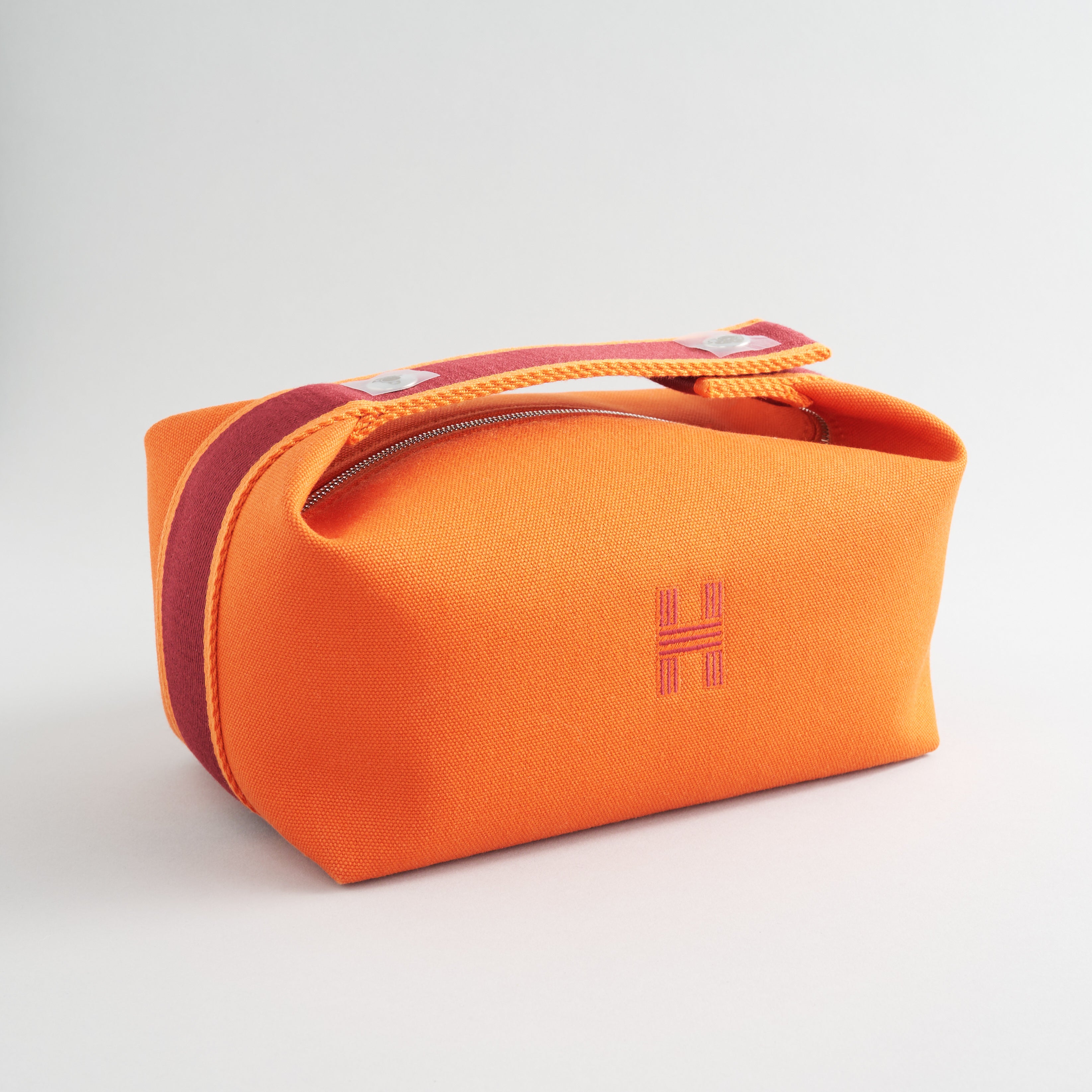 Hermès Bride De Brac Toiletry Bag PM Canvas Orange Feu Palladium Hardware