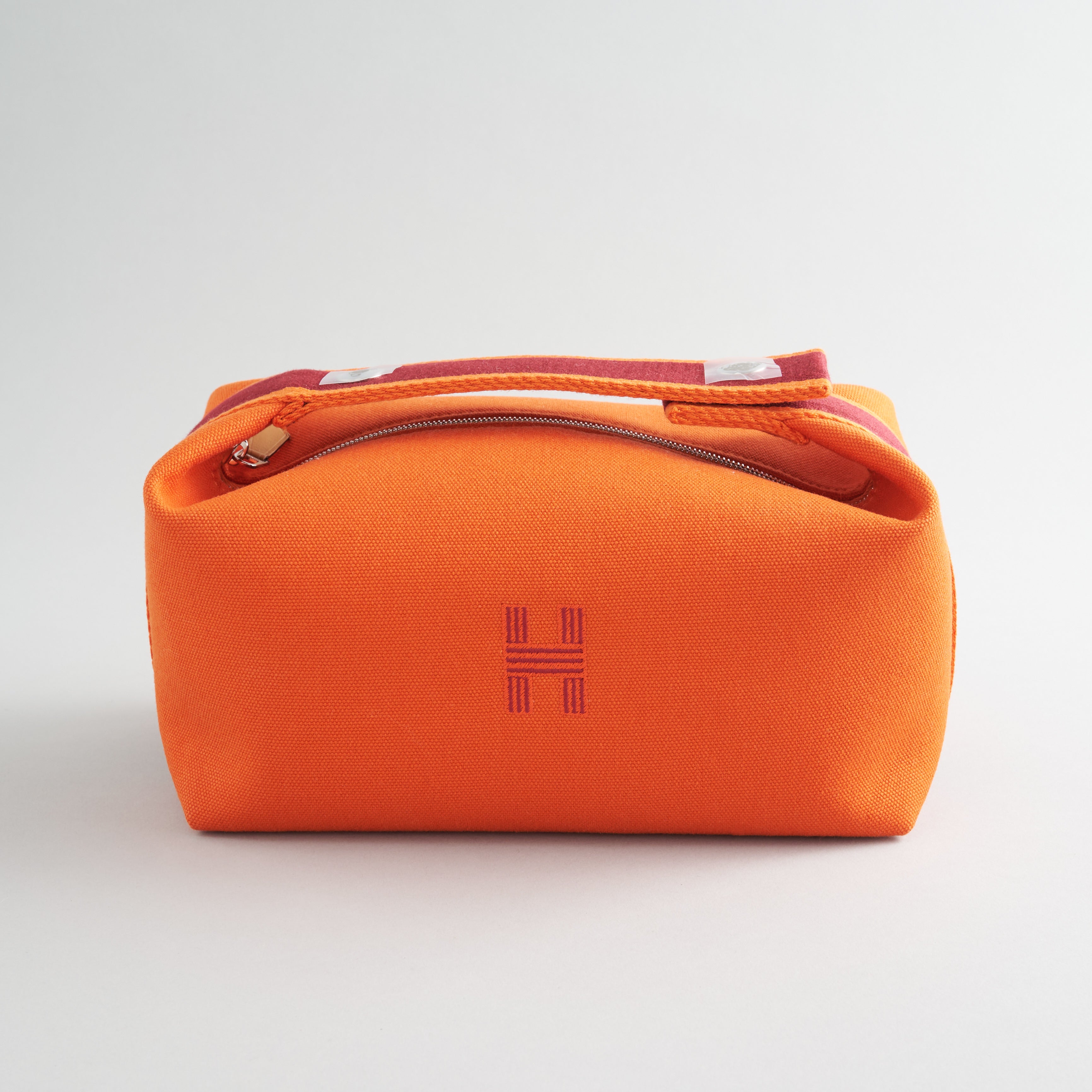 Hermès Bride De Brac Toiletry Bag PM Canvas Orange Feu Palladium Hardware