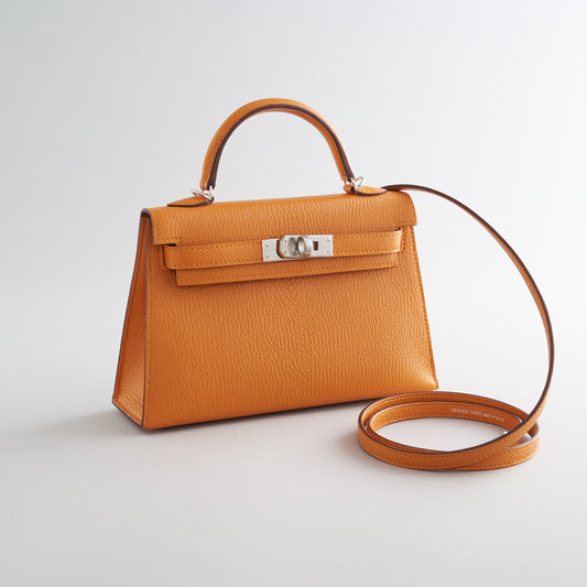 Hermès Kelly Mini Chevre Apricot/Cuivre Palladium Hardware Sellier