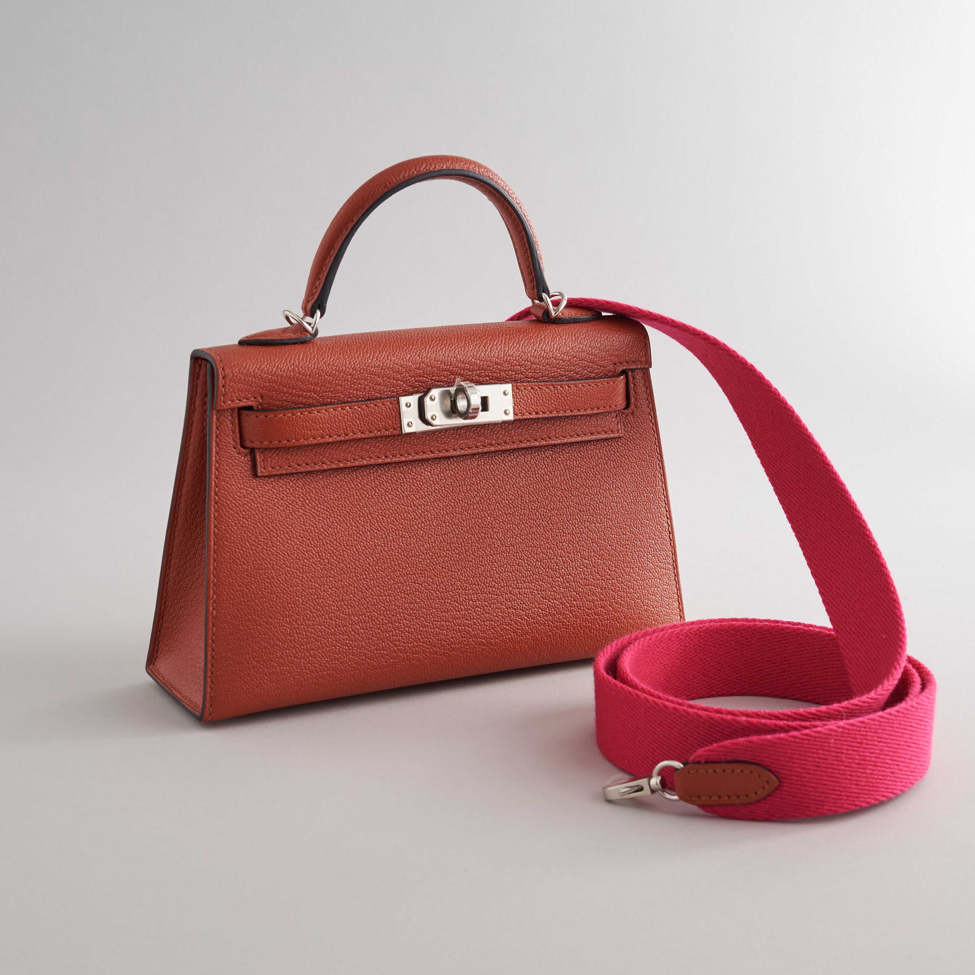 Hermès Kelly Mini Chevre Cuivre/Rose Mexico w/ Wool Strap Palladium Hardware